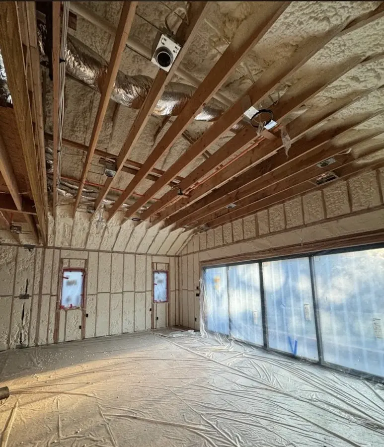 Interior walls and ceiling insulated with spray foam during new construction in Caledonia